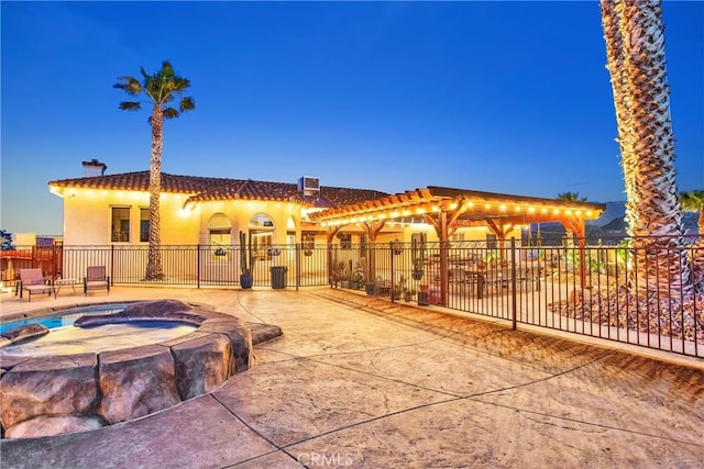 31024 Rabbit Springs Rd, Lucerne Valley, CA 92356 - view of front of property with stucco siding, fence, a tiled roof, a chimney, and a patio