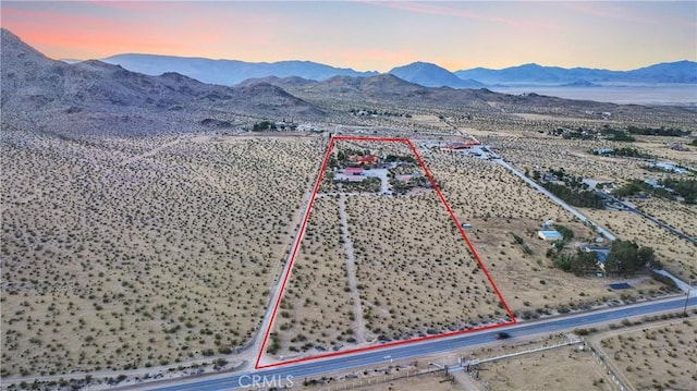 31024 Rabbit Springs Rd, Lucerne Valley, CA 92356 - view of rural area featuring mountains, property parcel outlined, and a desert landscape