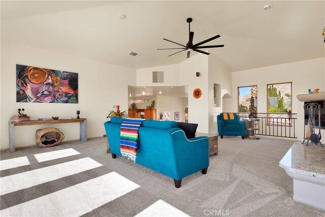 31024 Rabbit Springs Rd, Lucerne Valley, CA 92356 - carpeted living room with ceiling fan, high vaulted ceiling, and baseboards