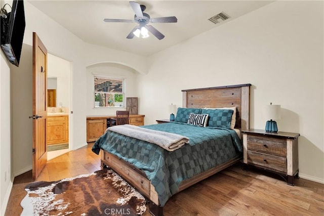 31024 Rabbit Springs Rd, Lucerne Valley, CA 92356 - bedroom featuring light wood-style floors, baseboards, and a ceiling fan