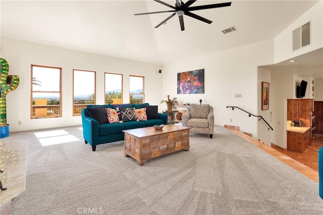 31024 Rabbit Springs Rd, Lucerne Valley, CA 92356 - living room featuring ceiling fan, high vaulted ceiling, and light colored carpet