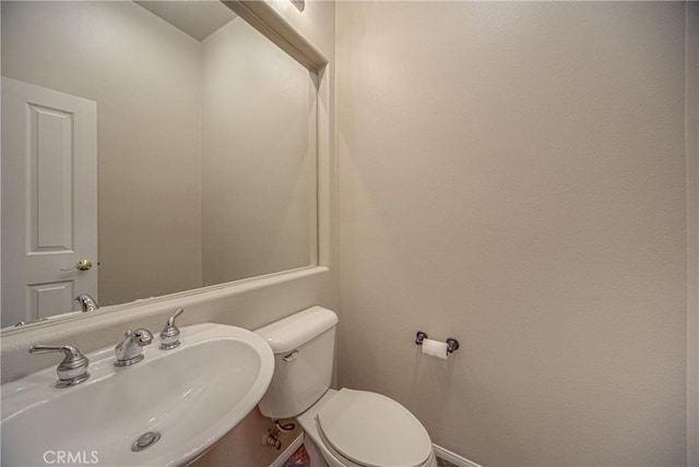 43922 Carentan Dr, Temecula, CA 92592 - half bath featuring a sink and baseboards