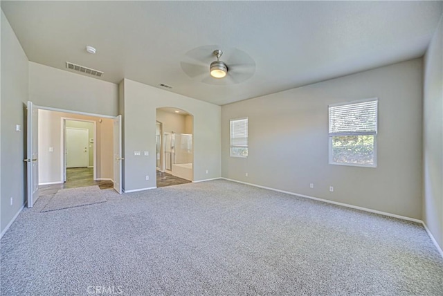 43922 Carentan Dr, Temecula, CA 92592 - unfurnished bedroom with arched walkways, carpet floors, and multiple windows