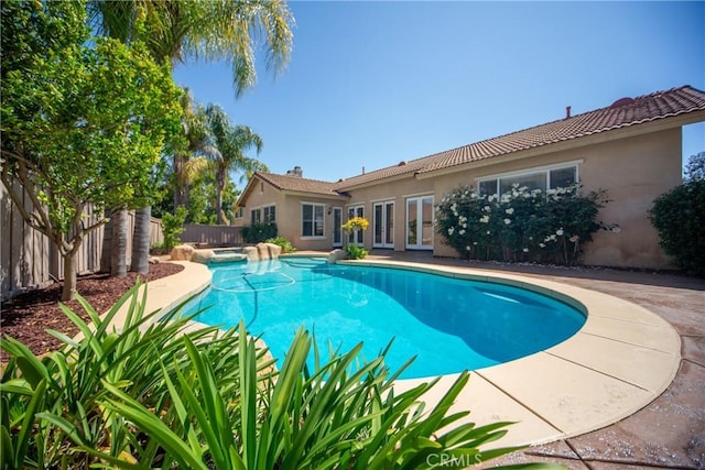 43922 Carentan Dr, Temecula, CA 92592 - view of pool with an outdoor hot tub and a fenced backyard