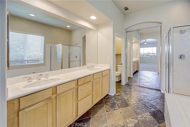 43922 Carentan Dr, Temecula, CA 92592 - bathroom with double vanity, a shower stall, recessed lighting, and ceiling fan
