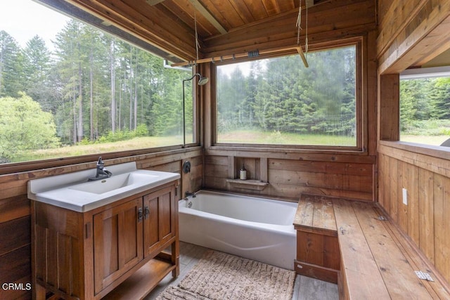 14480 Docker Hill Rd, Comptche, CA 95427 - full bathroom with wood walls, a bath, wood ceiling, hardwood / wood-style floors, and vanity