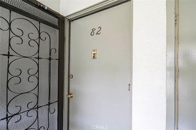 doorway to property with a gate