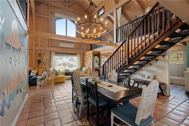 51609 Oregon Trl, Morongo Valley, CA 92256 - tiled dining room featuring baseboards, wooden ceiling, a chandelier, stairway, and beamed ceiling