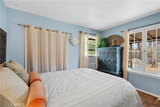 51609 Oregon Trl, Morongo Valley, CA 92256 - bedroom featuring wood finished floors, baseboards, and cooling unit