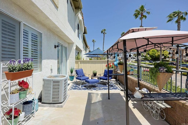 1825 Via Capri St, Chula Vista, CA 91913 - view of patio featuring central air condition unit, a gazebo, and fence