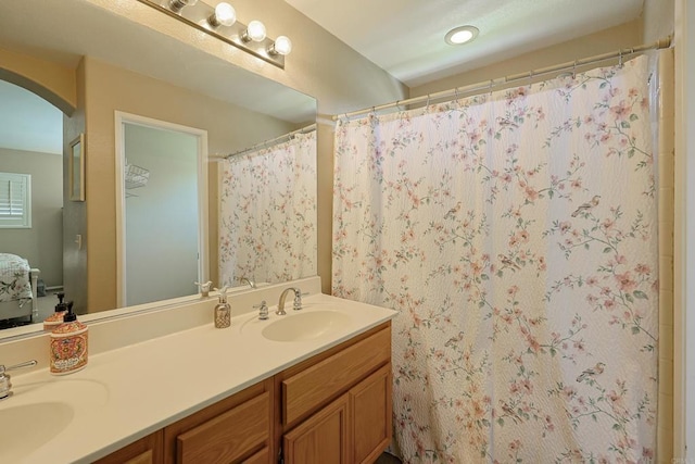 1825 Via Capri St, Chula Vista, CA 91913 - bathroom featuring double vanity and a shower with curtain