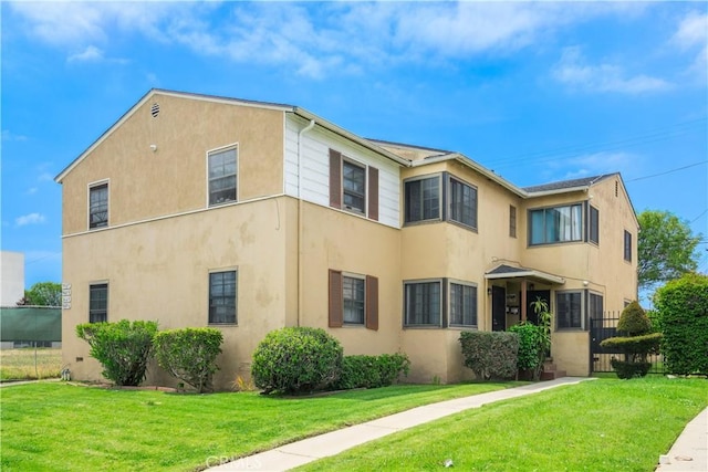 9027 Ramsgate Ave, Los Angeles, CA 90045 - view of property exterior with stucco siding and a yard