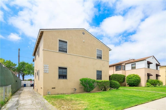 9027 Ramsgate Ave, Los Angeles, CA 90045 - view of property exterior with stucco siding and asphalt driveway
