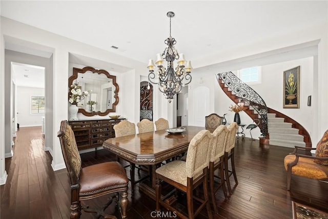 4448 St Cloud, Claremont, CA 91711 - dining room featuring a chandelier, stairway, dark wood-type flooring, and plenty of natural light