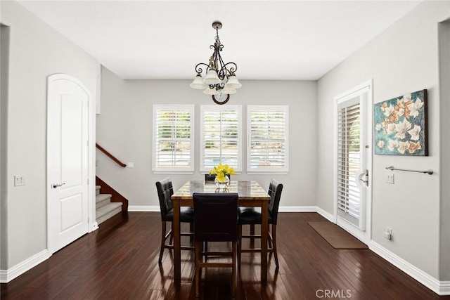4448 St Cloud, Claremont, CA 91711 - dining area featuring stairway, dark wood-style floors, baseboards, and a chandelier