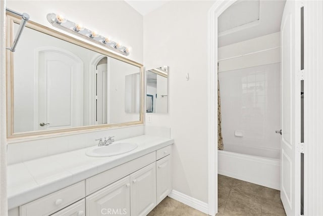 4448 St Cloud, Claremont, CA 91711 - bathroom with vanity, tile patterned floors, shower / tub combination, and baseboards