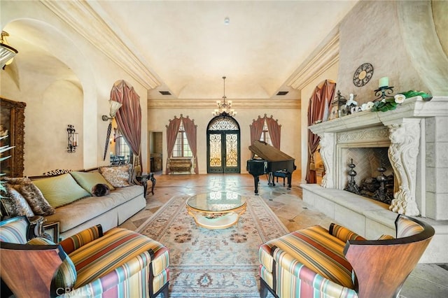 7811 Camino De Arriba, Rancho Santa Fe, CA 92067 - living area featuring arched walkways, a high end fireplace, crown molding, french doors, and stone tile flooring