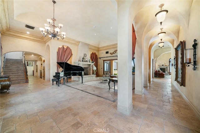 7811 Camino De Arriba, Rancho Santa Fe, CA 92067 - community lobby featuring a towering ceiling, stairs, ornamental molding, and recessed lighting