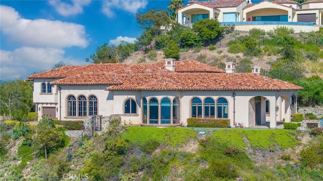 7811 Camino De Arriba, Rancho Santa Fe, CA 92067 - back of house featuring stucco siding and a tiled roof