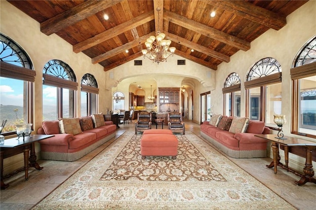 7811 Camino De Arriba, Rancho Santa Fe, CA 92067 - living area with arched walkways, wooden ceiling, high vaulted ceiling, plenty of natural light, and a chandelier
