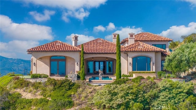 7811 Camino De Arriba, Rancho Santa Fe, CA 92067 - rear view of property with french doors, stucco siding, an in-ground hot tub, and a tiled roof