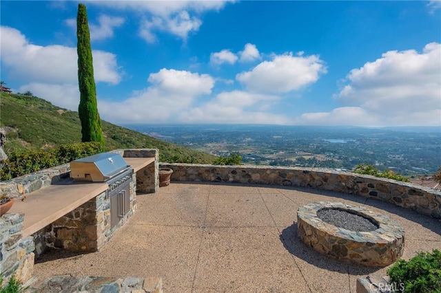 7811 Camino De Arriba, Rancho Santa Fe, CA 92067 - view of patio / terrace featuring an outdoor kitchen and an outdoor fire pit