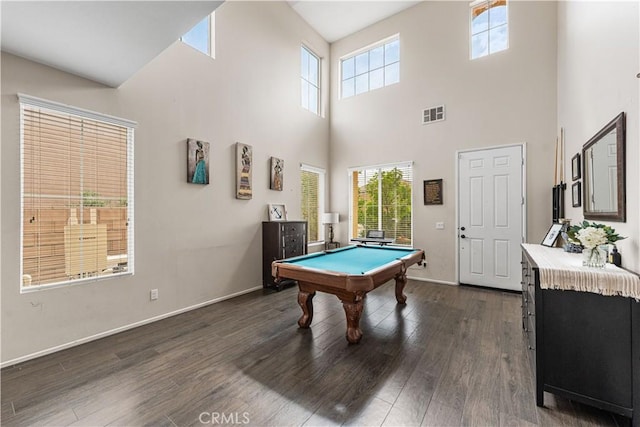 playroom with dark wood-style flooring, a towering ceiling, billiards table, and baseboards