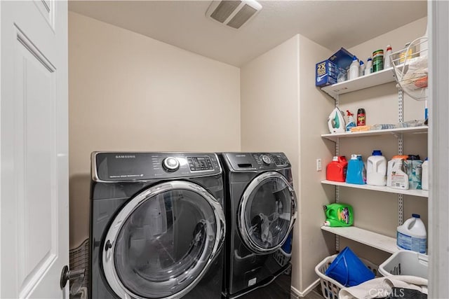 laundry area featuring washer and dryer