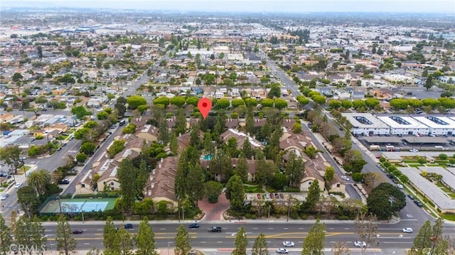 aerial overview of property's location with nearby suburban area