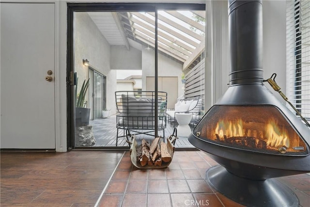 detailed view of a wood stove and wood finished floors