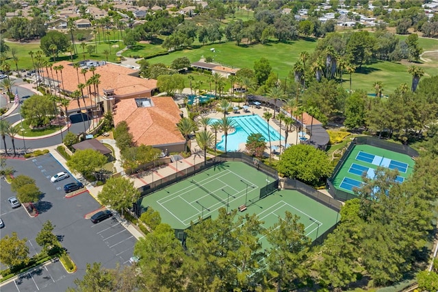 aerial view of a pool area and a golf course