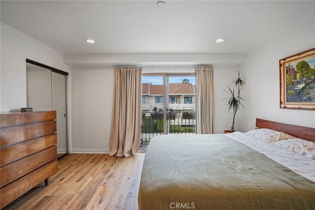 14702 Magnolia Blvd Unit 104, Sherman Oaks, CA 91403 - bedroom with light wood-type flooring, access to outside, recessed lighting, and baseboards