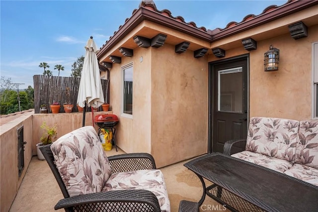 14702 Magnolia Blvd Unit 104, Sherman Oaks, CA 91403 - doorway to property featuring stucco siding and fence
