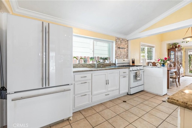 171 Brook St, San Luis Obispo, CA 93401 - kitchen with white appliances, vaulted ceiling, white cabinets, crown molding, and light tile patterned floors