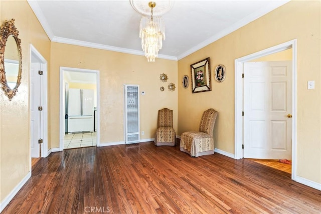 171 Brook St, San Luis Obispo, CA 93401 - unfurnished room featuring a heating unit, wood finished floors, a chandelier, and crown molding
