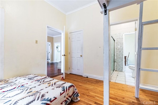 171 Brook St, San Luis Obispo, CA 93401 - bedroom featuring crown molding, wood finished floors, a barn door, and ensuite bathroom