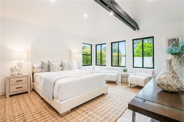bedroom featuring beam ceiling, high vaulted ceiling, and recessed lighting