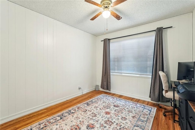 16133 Haldane St, Whittier, CA 90603 - office with a ceiling fan, wood finished floors, a textured ceiling, and baseboards