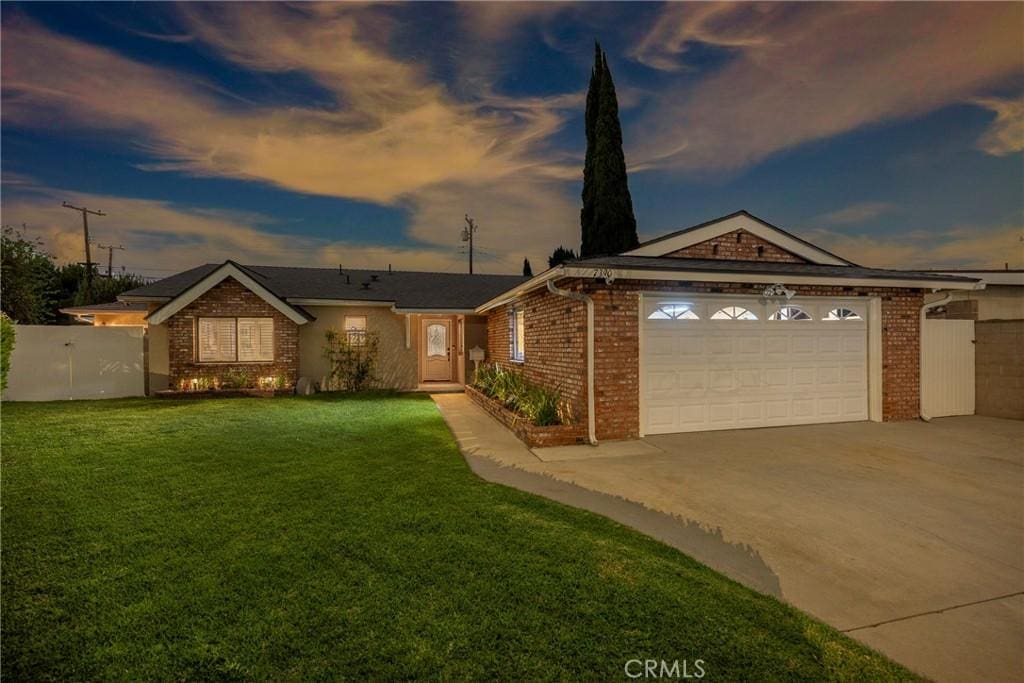 7390 Blackhawk Cir, Buena Park, CA 90620 - single story home with an attached garage, driveway, and brick siding
