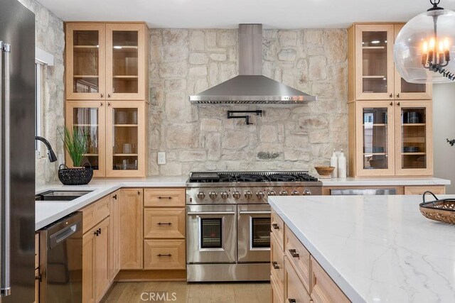 2506 E Roberta Dr, Orange, CA 92869 - kitchen with stainless steel appliances, wall chimney range hood, a sink, light brown cabinets, and glass insert cabinets