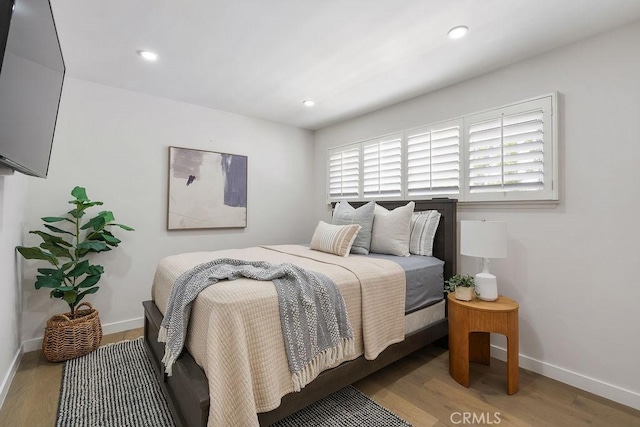 2506 E Roberta Dr, Orange, CA 92869 - bedroom featuring baseboards, wood finished floors, and recessed lighting