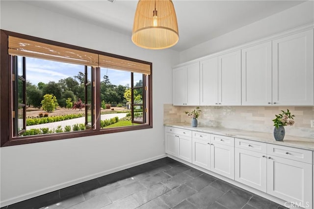 11 Deodar Ln, Bradbury, CA 91008 - kitchen featuring baseboards, healthy amount of natural light, decorative backsplash, and white cabinets