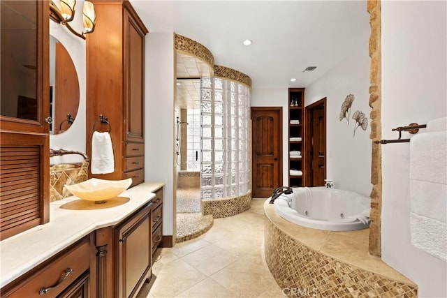 4117 Vanetta Pl, Studio City, CA 91604 - full bathroom with vanity, a tub with jets, a tile shower, recessed lighting, and tile patterned floors