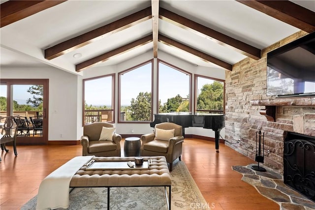 4117 Vanetta Pl, Studio City, CA 91604 - living room featuring baseboards, hardwood / wood-style flooring, and a fireplace