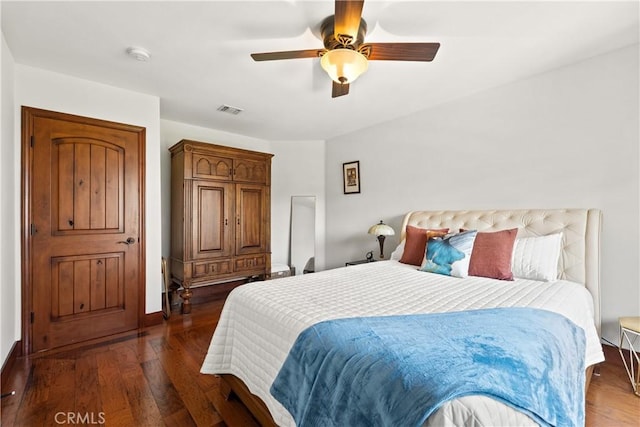 4117 Vanetta Pl, Studio City, CA 91604 - bedroom featuring wood finished floors, a ceiling fan, and baseboards