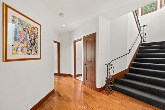 4117 Vanetta Pl, Studio City, CA 91604 - hallway featuring wood finished floors, stairway, baseboards, and recessed lighting