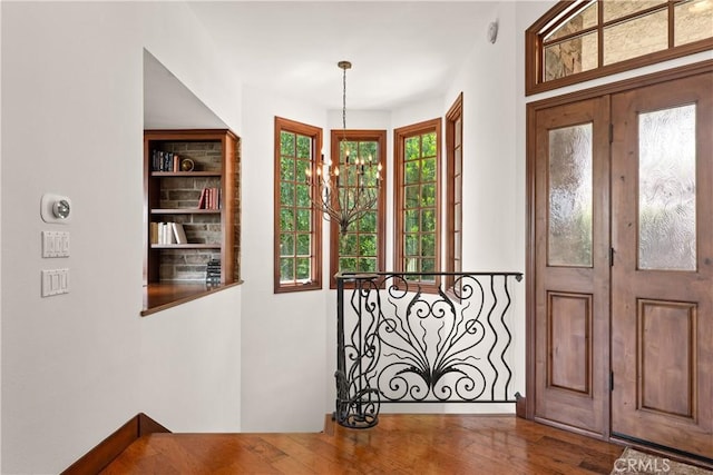 4117 Vanetta Pl, Studio City, CA 91604 - foyer with healthy amount of natural light and wood finished floors