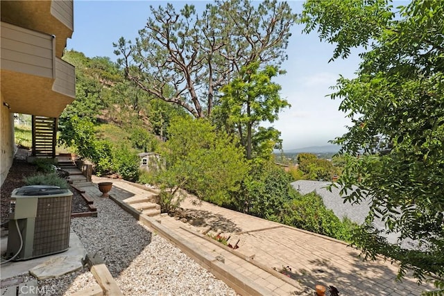 4117 Vanetta Pl, Studio City, CA 91604 - view of yard featuring stairway and central AC unit