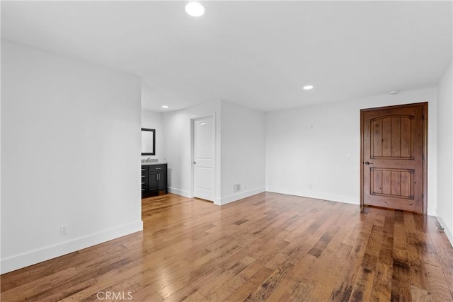 4117 Vanetta Pl, Studio City, CA 91604 - unfurnished living room featuring recessed lighting, baseboards, and light wood-style flooring