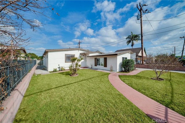 ranch-style house with stucco siding